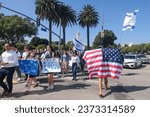 Small photo of Pro-Israel demonstrators take place in a rally in response to the attack in Israel, outside West Los Angeles federal building,Tuesday, Oct. 10, 2023, in Los Angeles.