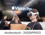 Small photo of A customer tries the Vision Pro at Apple The Grove in Los Angeles, California, Friday, February 2, 2024. The Vision Pro, Apple’s first new product since the Apple Watch nine years ago.