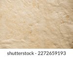 Small photo of Texture of coarse flour dough. Bread dough background.