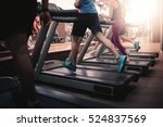 People running in machine treadmill at fitness gym club