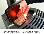 Modern domestic pellet stove, granules stove, pellet bag with 3d printed bucket