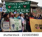 Small photo of London, UK. October 12th, 2019. Doctors, nurses and other health workers seen protesting on Trafalgar Square for a health emergency at an Extinction Rebellion protest.