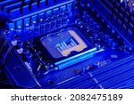 Small photo of SANTA CLARA, Calif. November 29, 2021: LGA1700 processor socket on Intel motherboard based on Z690 chipset. Blue lighting