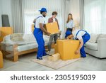 Small photo of Two removal company workers are delivery service removing things from the house,Carrying furniture and other belongings.