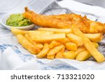 Traditional English Food such as Fish and Chips with mushy peas served in the Pub or Restaurant