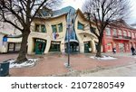 Small photo of Sopot, Pomorskie Voivodeship, January 8, 2022. Interesting, historic buildings on the main street of Bohaterow Monte Cassino, Krzywy Domek