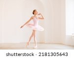 Little girl ballerina dancer in ...