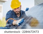 Small photo of Electrical engineer on solar farm with large structure Check maintain rehearse damaged parts from use in order to produce electricity with maximum efficiency throughout its service life professionally