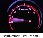 Close up shot of a speedometer in a car. At an engine speed of 800 rpm on Car dashboard.Car Interior ilumination.