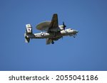 Small photo of Wallops Flight Facility, Virginia, USA - October 1, 2021: E-2C Hawkeye 656 from VAW-120 squadron circling round to perform a touch and go at NASA Wallops Flight Facility.