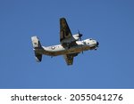 Small photo of Wallops Flight Facility, Virginia, USA - October 1, 2021: C-2A Greyhound from VAW-120 squadron at NASA Wallops Flight Facility practicing touch and goes on the airfield.