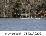 Small photo of Norfolk, Virginia, USA - April 2, 2022: Boats 3 and 4 of the coxless pairs fighting for a place in their heat to go through to the final