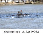 Small photo of Norfolk, Virginia, USA - April 2, 2022: The coxless pair from Great Bridge just making their way up to the start line