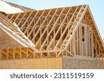 plywood house rafters roof wooden house framework building site boatd