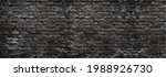abstract dark gloomy gray brick ... | Shutterstock . vector #1988926730