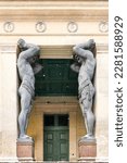 Small photo of Saint Petersburg, Russia - Dec 27, 2021: Toes of the Atlas statue, tourist omen to make a wish. Classic architecture of Saint-Petersburg, Russia.