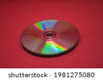 A Cd Rom On Red Background....