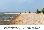 Small photo of Southampton, Ontario - August 5, 2021: People at the beach on Lake Huron in Southampton, Ontario, Canada.