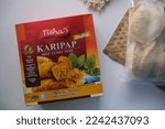 Small photo of Kelantan, Malaysia - November 18, 2022 : One of Tisha's frozen products is Beef Curry Puff (in malay Karipap Daging). Made from flour and beef filling inside.