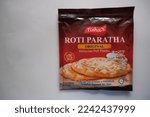 Small photo of Kelantan, Malaysia - November 18, 2022 : One of Tisha's frozen products is Puff Paratha (in malay Roti Paratha).