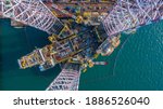 Small photo of Aerial view maintenance repair of the jack up oil and gas rig up in the shipyard, Offshore oil and Gas processing platform, oil and gas industry.