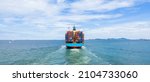 Small photo of Container ship leaving the industrial seaport, Global business Import export, Company business logistic and transportation international by container cargo freight ship in the open sea.