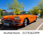An Orange 1959 Chevrolet...