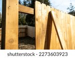 Small photo of Cedar Wood Fence With Missing Boards - Fencing Construction Build