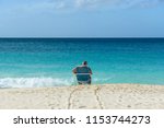 A Man Relax On A Chair In The...