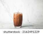 Iced cocoa in clear glass on...
