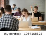 Small photo of Happy female worker gesturing Yes satisfied with good news on stock market and company business success while working in coworking space. Student excited with high evaluating grade. Reward, recompense