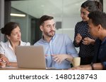 Small photo of Multi-ethnic professionals colleagues gather together discuss startup ideas, diverse associates listening team leader or mentor give instructions analyzing results of work, teamwork brainstorm concept