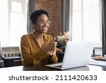Small photo of Smiling friendly African American therapist in glasses talking on video call, using sign language, speaking to patient with hearing disability, deafness, showing gestures at screen