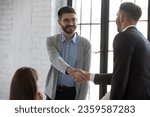 Small photo of Businessman shake hand greeting get acquainted with smiling male employer at meeting, business partners handshake closing deal at briefing, make agreement at office negotiation, acquaintance concept