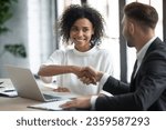 Small photo of Smiling multiethnic business partners shake hands get acquainted greeting at office meeting, happy diverse colleagues businesspeople handshake close deal agreement at briefing, acquaintance concept