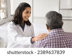 Small photo of Happy young doctor woman enjoying medical job, giving support to older patient, talking to man for healthcare examination, checkup, touching shoulder with support, sympathy