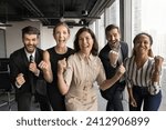 Small photo of Excited group of business colleagues celebrating team success, making winner yeas gestures, looking at camera for portrait, shouting for joy, laughing, having fun, enjoying successful teamwork
