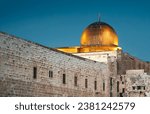 Small photo of Al Aqsa Mosque on the Temple Mount in the Old Town of Jerusalem, Israel. View on the ancient mosque along southern wall of al-Haram al-Sharif, silver dome of Al-Aqsa in evening gold illumination.