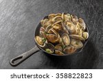 Iron Pan And Short Necked Clam...