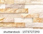 Natural River Stone Cladding Mosaic Tile Wall .Old stone facade, seamless pattern . Top view, copy space.