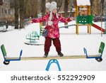 Small photo of balancing girl stand on a teeter-totter