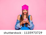 I want like on instagram! Crazy subscriber addicted people person concept. Close up photo portrait of attractive funny cheerful toothy lady using holding cellular in hand isolated bright background