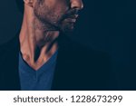Small photo of Cropped close-up portrait of nice lovely well-groomed self-content handsome attractive classy chic man in blazer suit chin isolated over dark black background