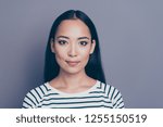 Small photo of Close up photo portrait of dreamy attractive she her girl looking openhearted sincerely with brown eyes wearing white striped pullover isolated on grey background