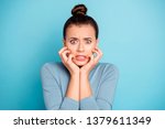 Close up photo beautiful amazing she her lady oh no lose epic fail face hold hands arms raised cheeks cheekbones funny funky stylish hairstyle wear sweater pullover isolated blue bright background