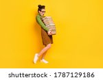 Full length body size profile side view of her she attractive overwhelmed intellectual girl carrying many book science isolated bright vivid shine vibrant yellow color background
