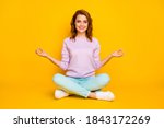 Full body photo of positive cheerful girl sit floor legs crossed meditate yoga show om sign wear pink turquoise outfit white gumshoes isolated over bright color background