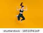 Small photo of Sportive excited lady jump high up succeed training wear sports suit shoes isolated yellow color background
