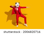 Small photo of Photo of modern dancer panda guy dance move wear mask red tuxedo tie shoes isolated on yellow color background