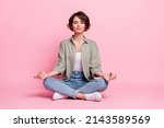 Full body photo of pretty focused lady sit lotus position meditate mudra fingers isolated over pastel color background